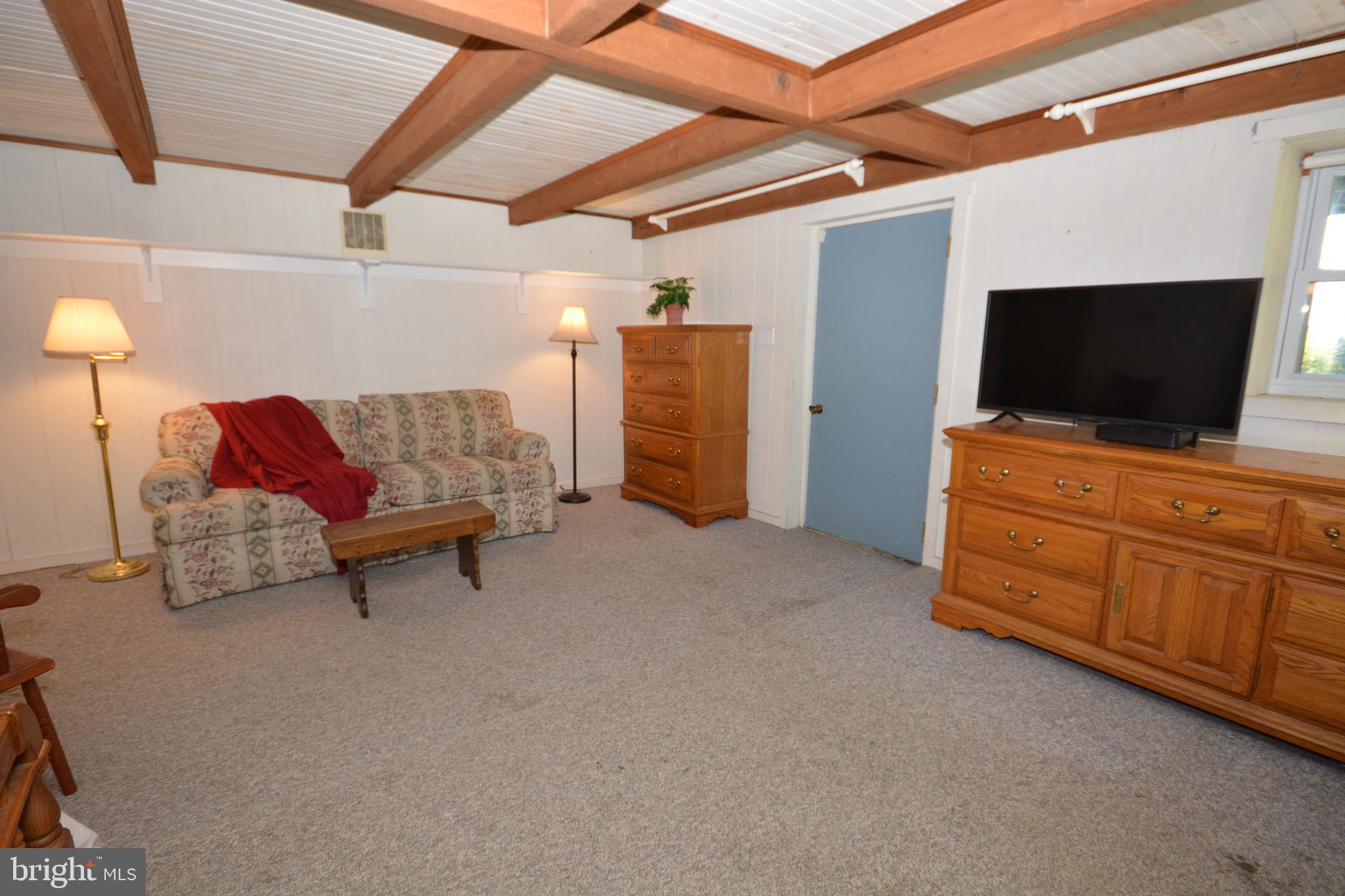409 Hain Road Reading, PA 19608 - Photo 30 of 38 LL Bedroom 4 w/ Door to Rear Yard
