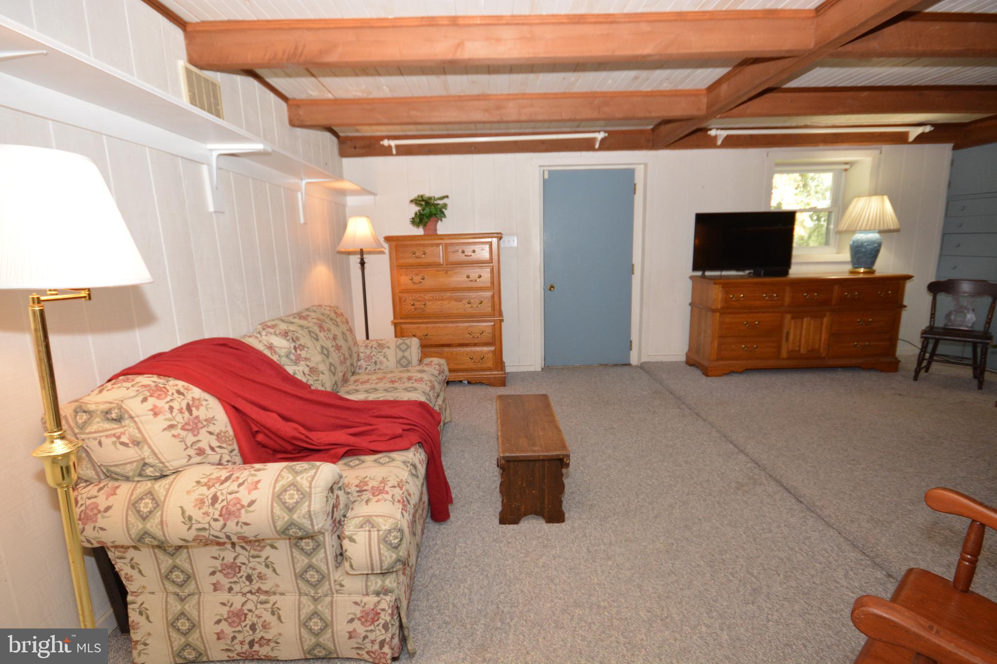 409 Hain Road Reading, PA 19608 - Photo 31 of 38 LL Bedroom 4 w/ Door to Rear Yard