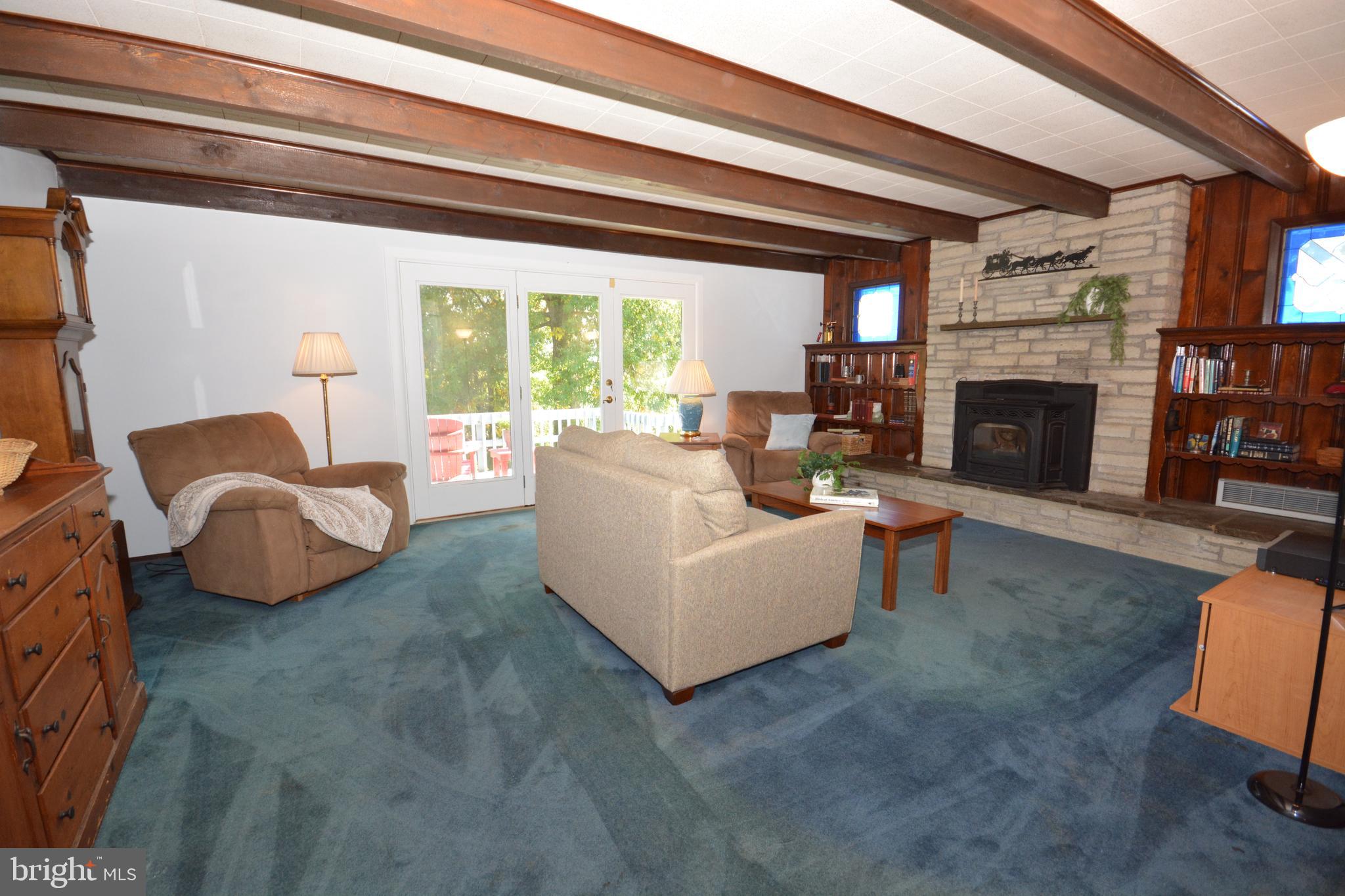 409 Hain Road Reading, PA 19608 - Photo 7 of 38 Living Room w/ Doors to Deck
