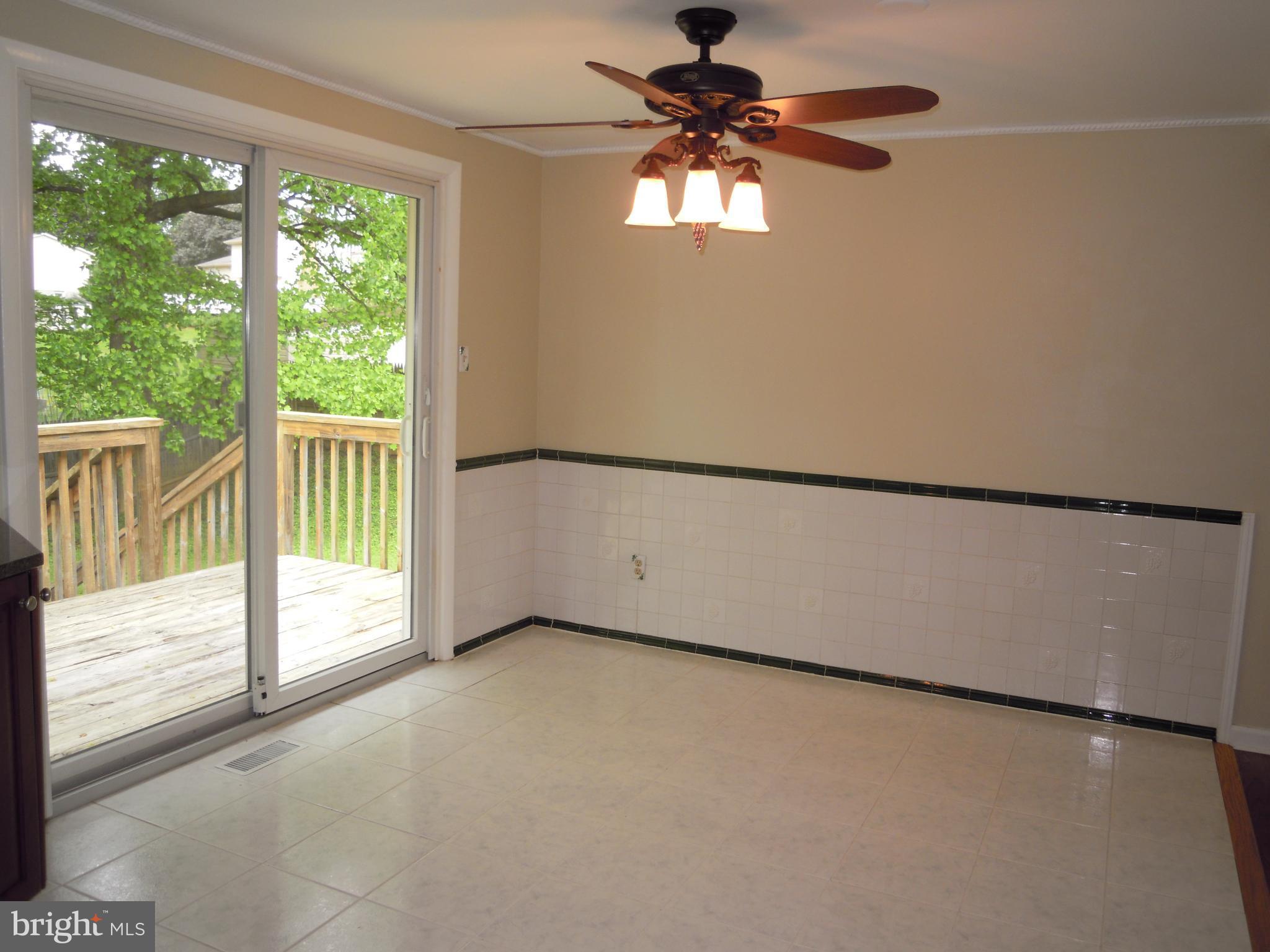 3920 Millner Road Baltimore, MD 21236 - Photo 8 of 30 Bright, spacious Kitchen/Dining area opens to Deck