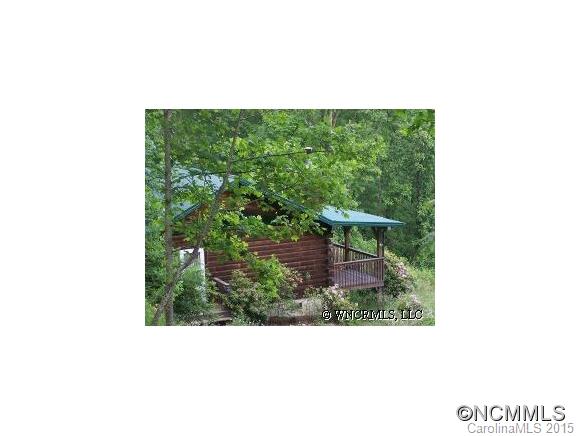 460 Barn Cove Road Clyde, NC 28721 - Photo 1 of 24 a picture of wall with a bench