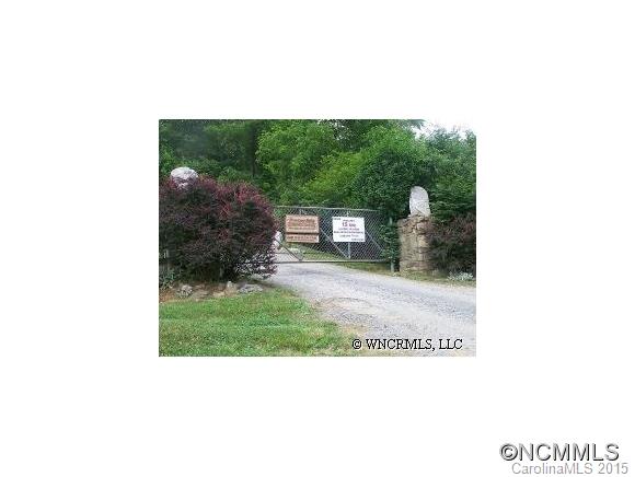 460 Barn Cove Road Clyde, NC 28721 - Photo 10 of 24 a picture of a bench in front of a house