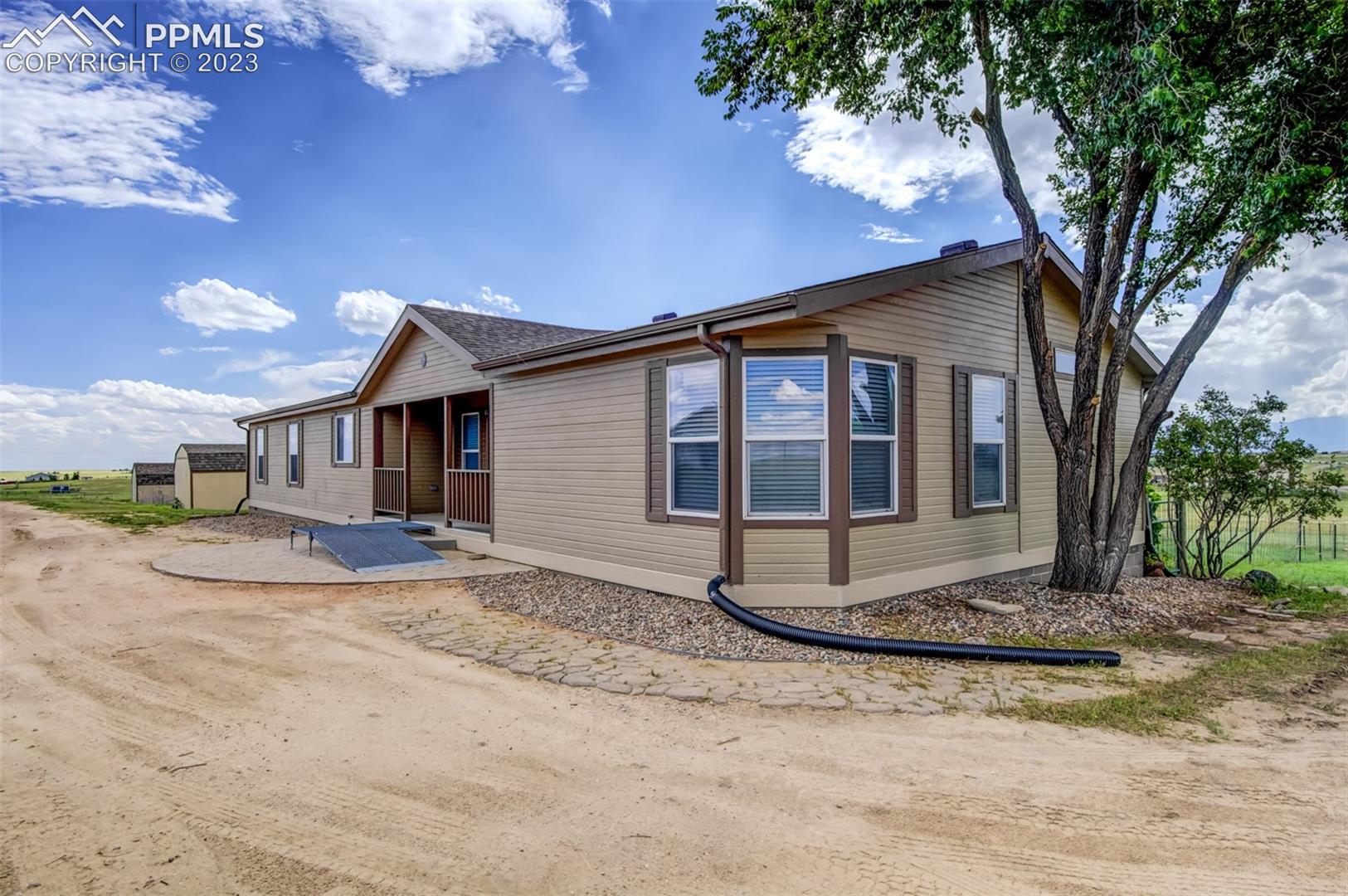 16215 Stage Stop Road Peyton, CO 80831 - Photo 1 of 33 Front Drive