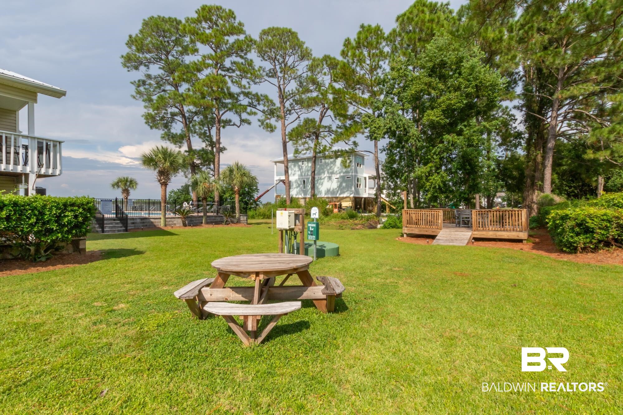 25925 -C Canal Road, Unit 203 Orange Beach, AL 36561 - Photo 38 of 57 View of yard with a deck
