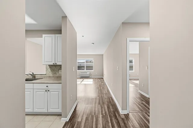 a view of a kitchen from the hallway