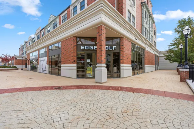 a building exterior with stairs and windows