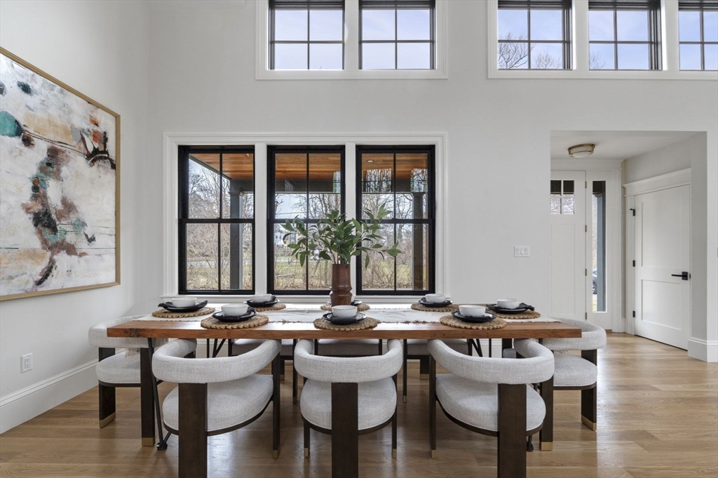 16 Liberty Road Marblehead, MA 01945 - Photo 12 of 42 a view of a a dining room with furniture window and wooden floor