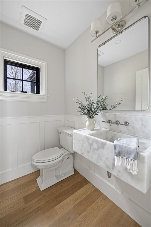 16 Liberty Road Marblehead, MA 01945 - Photo 18 of 42 a bathroom with a sink toilet and shower