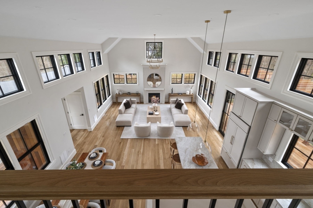 16 Liberty Road Marblehead, MA 01945 - Photo 22 of 42 a living room with furniture and a wooden floor