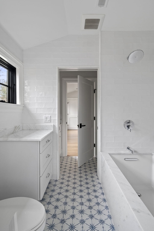 16 Liberty Road Marblehead, MA 01945 - Photo 34 of 42 a bathroom with a sink a toilet and shower