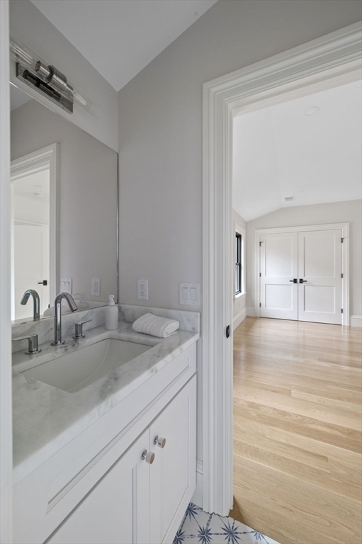 16 Liberty Road Marblehead, MA 01945 - Photo 35 of 42 a bathroom with a sink and a mirror