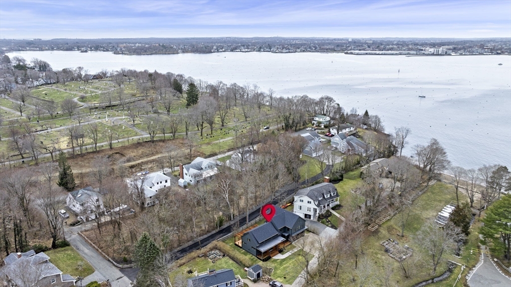16 Liberty Road Marblehead, MA 01945 - Photo 40 of 42 a view of a lake with a mountain