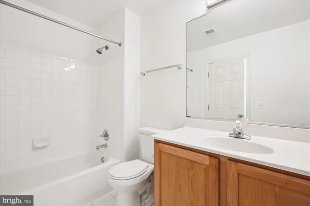 a view of a room with wooden walls