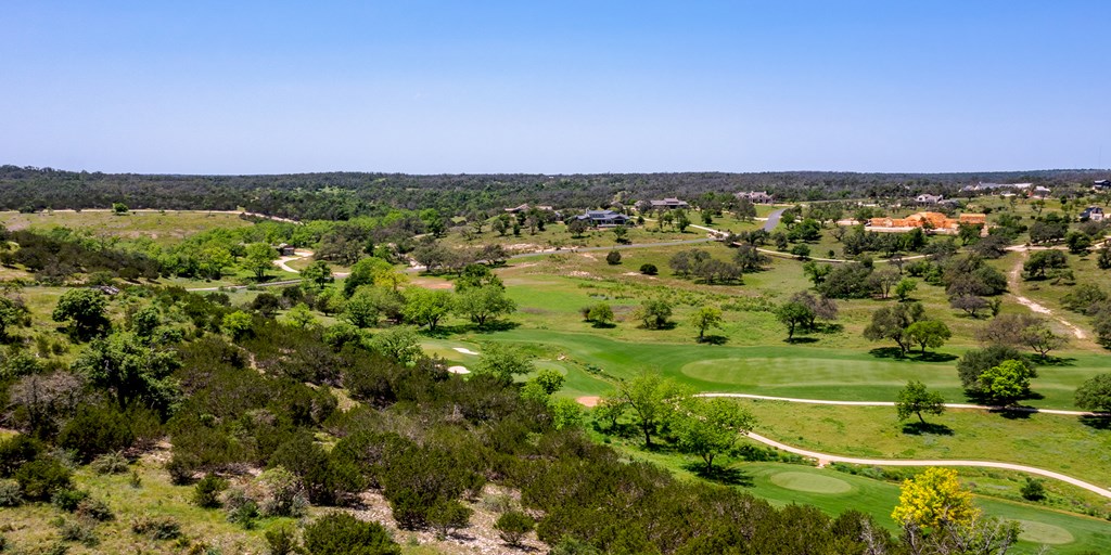 19 Boot Ranch Circle, Unit 19R Fredericksburg, TX 78624 - Photo 5 of 10 an aerial view of a houses with a outdoor space