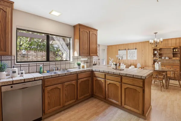 a bedroom with a bed and a table in it