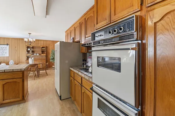 a bathroom with a shower and a mirror
