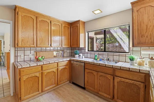 a bedroom with a bed and glass door