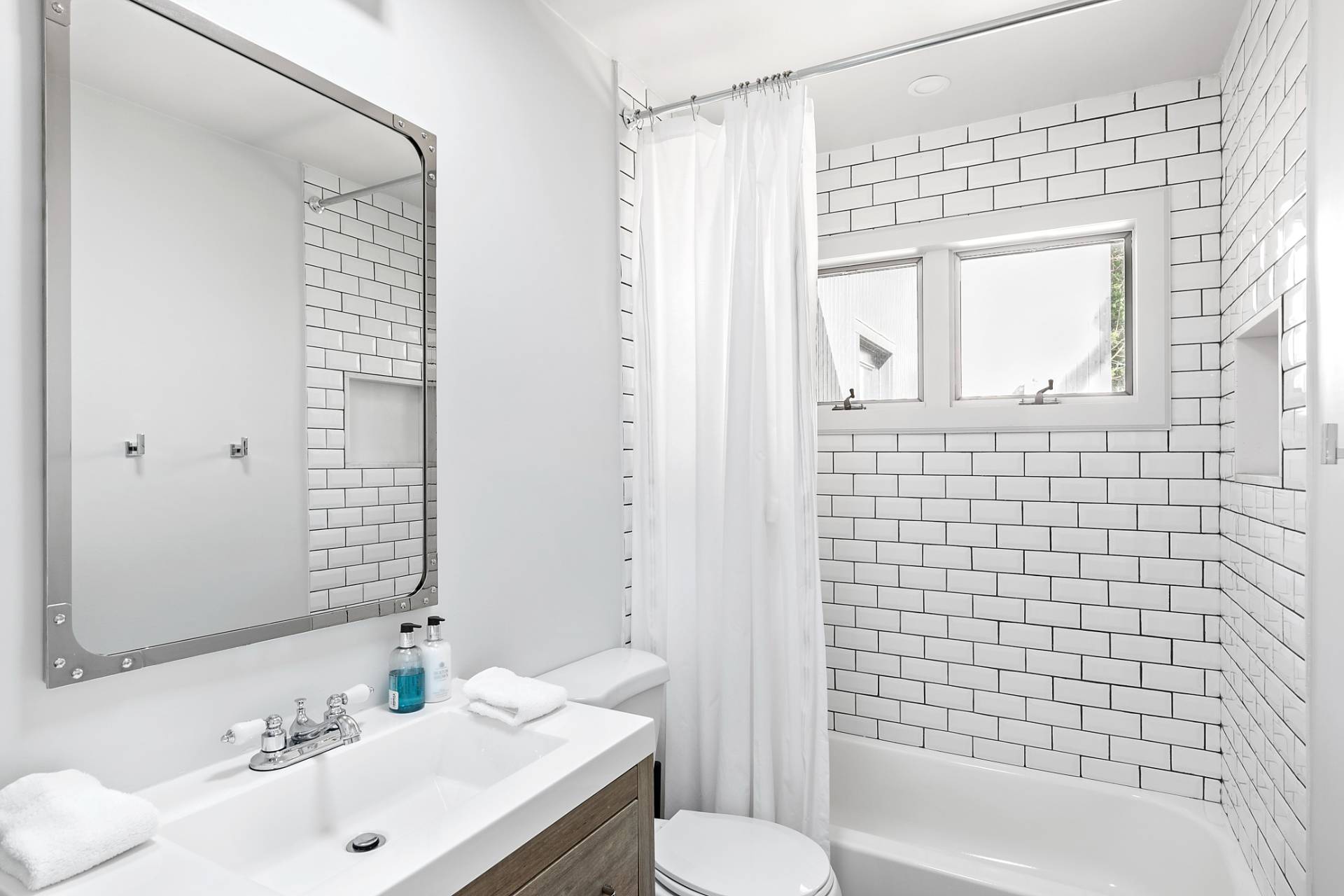 33 Bluff Point Road Sag Harbor, NY 11963 - Photo 8 of 20 a bathroom with a sink toilet and shower