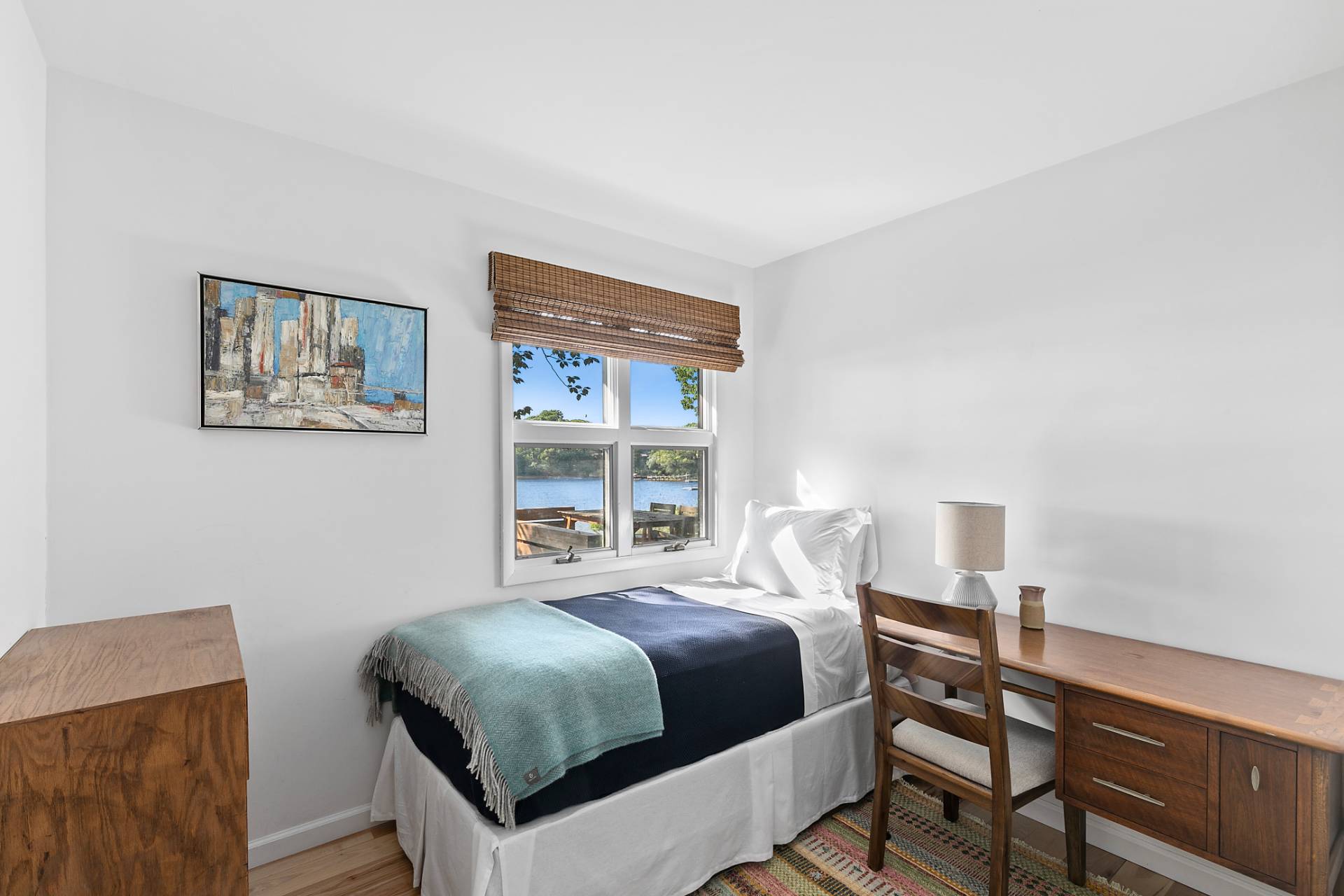 33 Bluff Point Road Sag Harbor, NY 11963 - Photo 10 of 20 a bedroom with a bed and a window