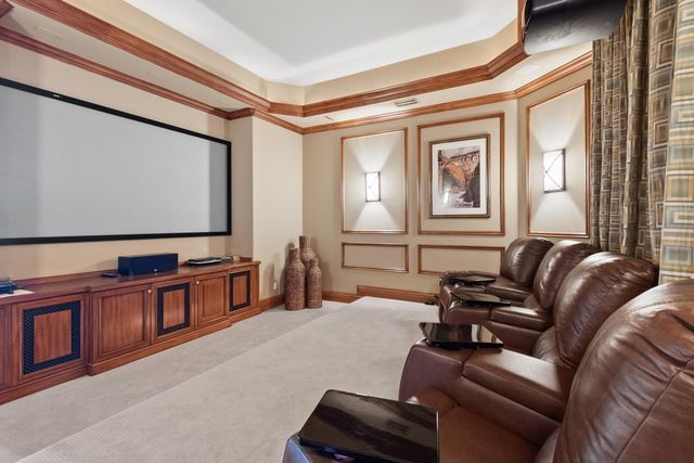 a living room with furniture and a lamp