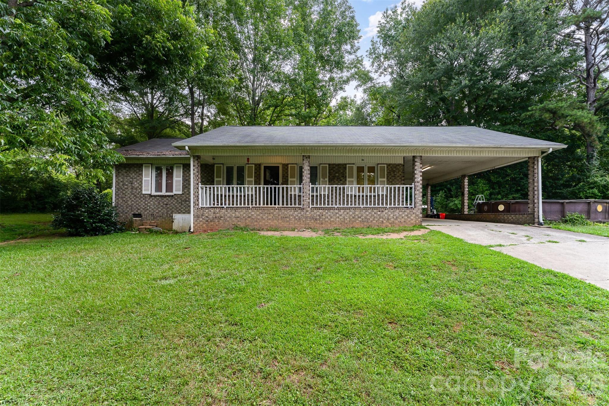 280 Dallas Spencer Mountain Road Gastonia, NC 28056 - Photo 1 of 19 a front view of house with yard and green space