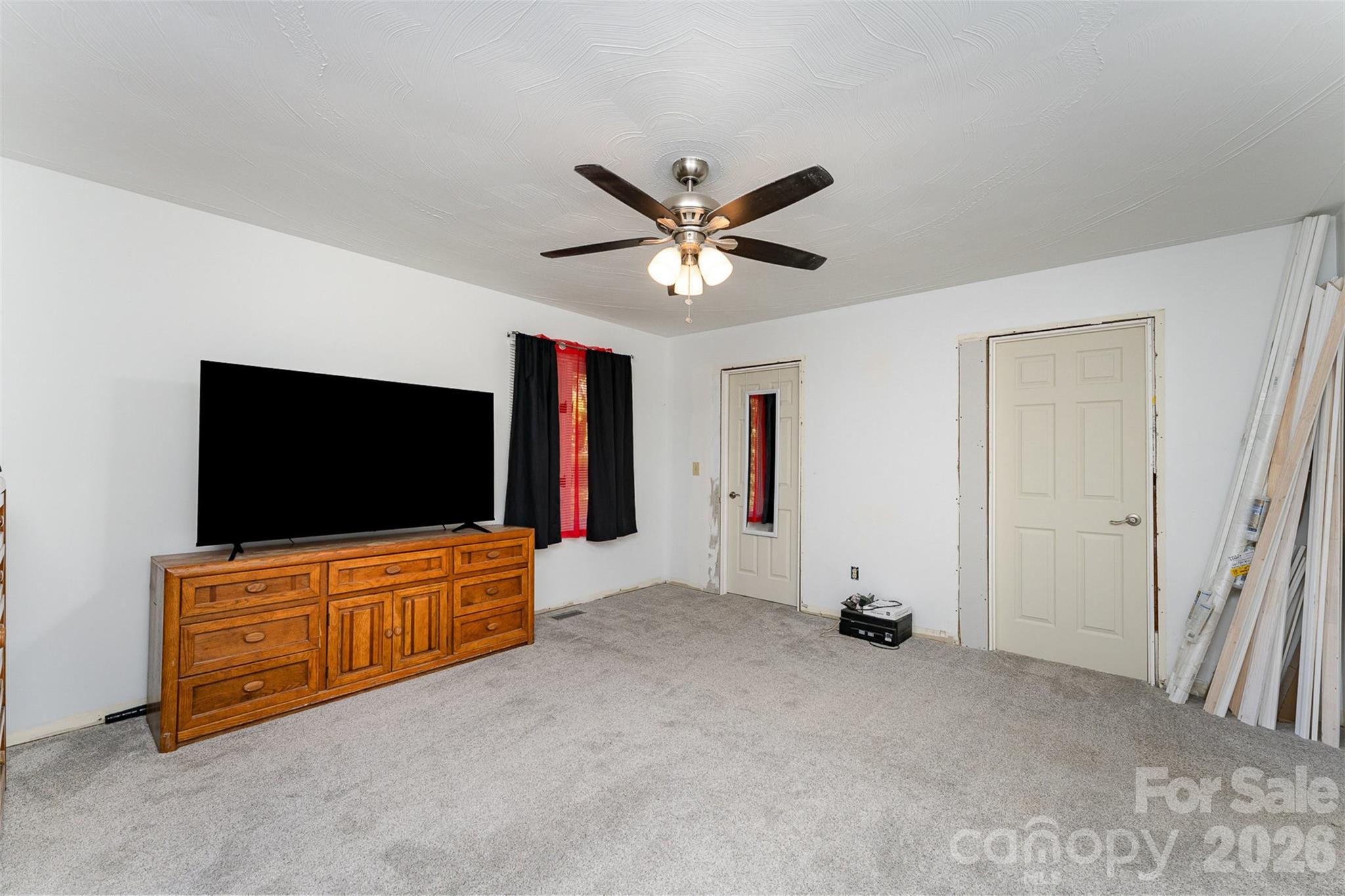280 Dallas Spencer Mountain Road Gastonia, NC 28056 - Photo 12 of 19 a living room with furniture and a flat screen tv