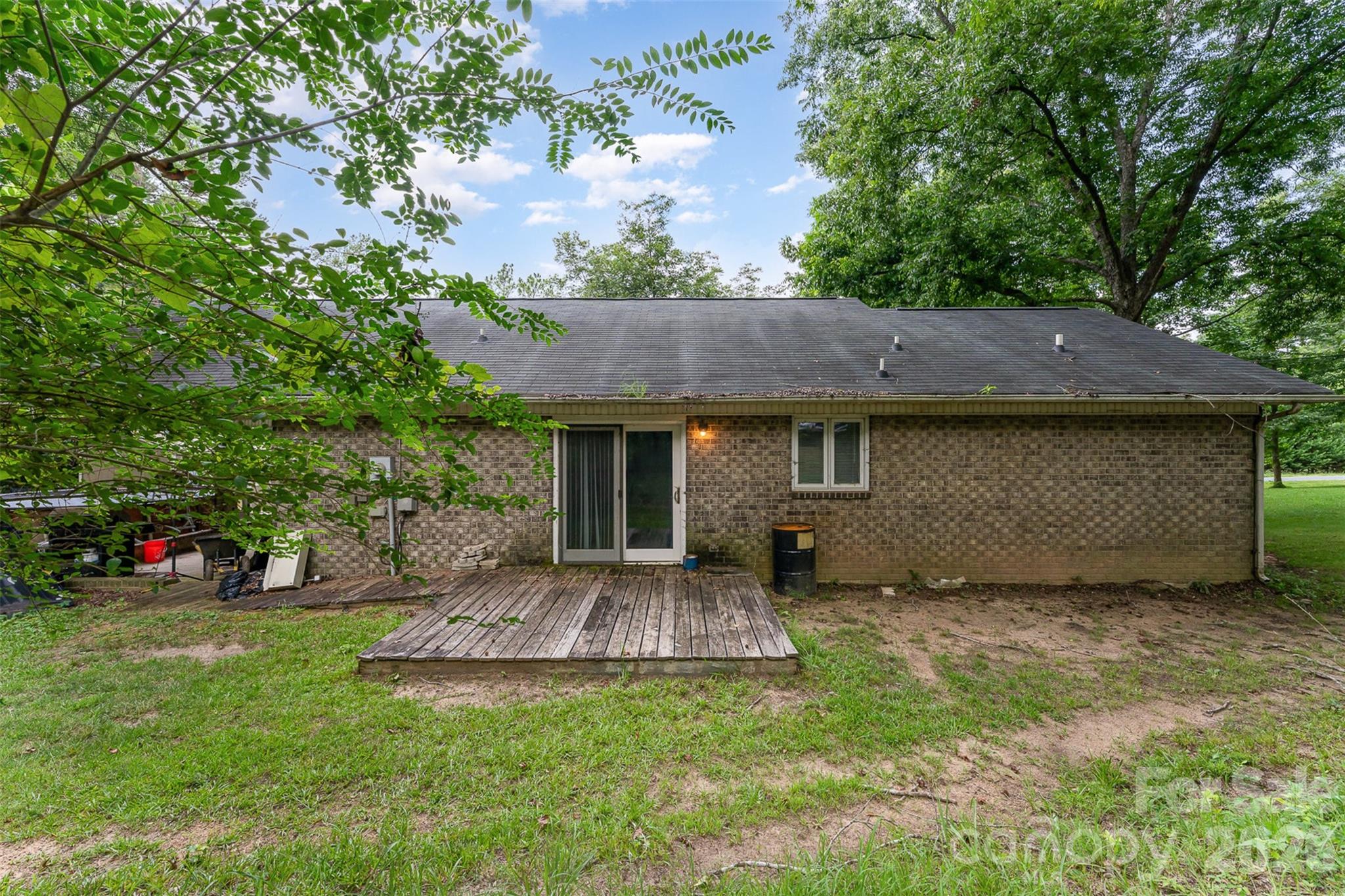 280 Dallas Spencer Mountain Road Gastonia, NC 28056 - Photo 17 of 19 a view of a house with a yard