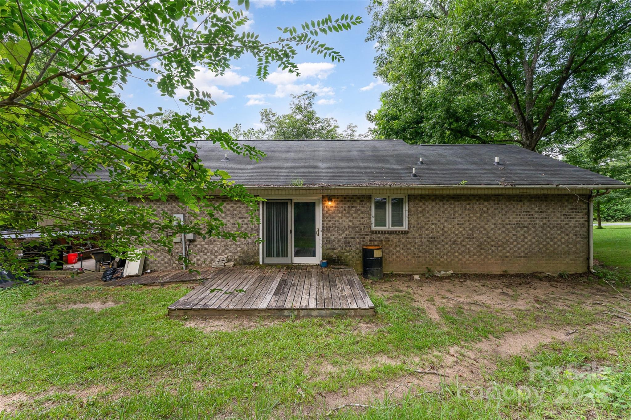 280 Dallas Spencer Mountain Road Gastonia, NC 28056 - Photo 17 of 19 a view of a house with a yard