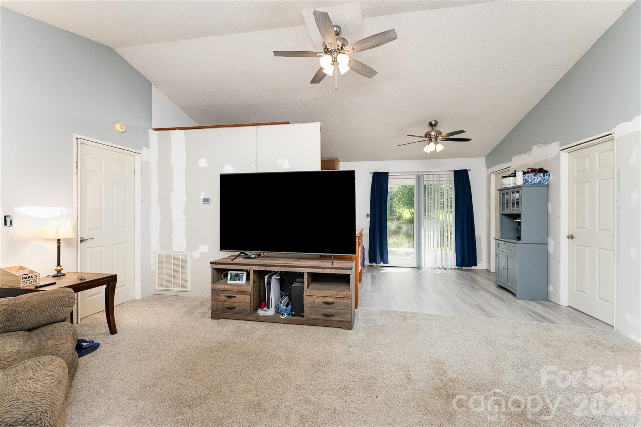 280 Dallas Spencer Mountain Road Gastonia, NC 28056 - Photo 5 of 19 a living room with furniture and a flat screen tv
