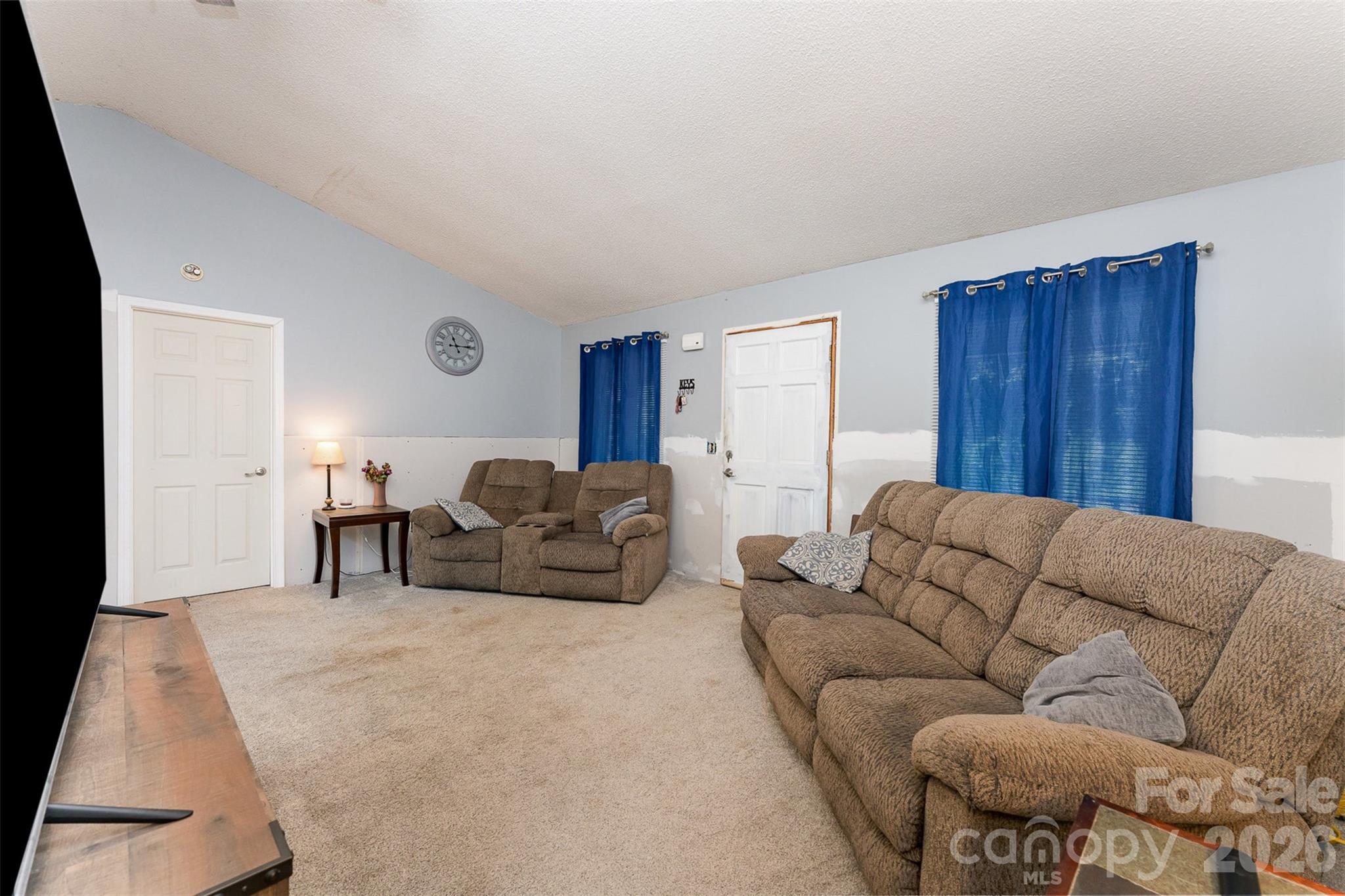 280 Dallas Spencer Mountain Road Gastonia, NC 28056 - Photo 7 of 19 a living room with furniture window and a lamp