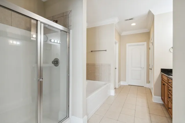 a bathroom with granite countertop a sink and a mirror