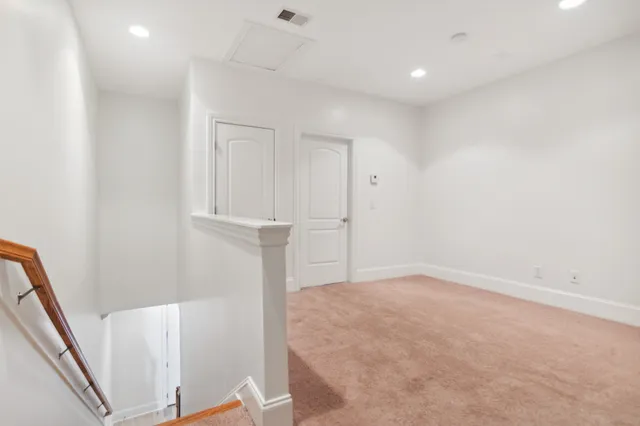 an empty room with an entryway