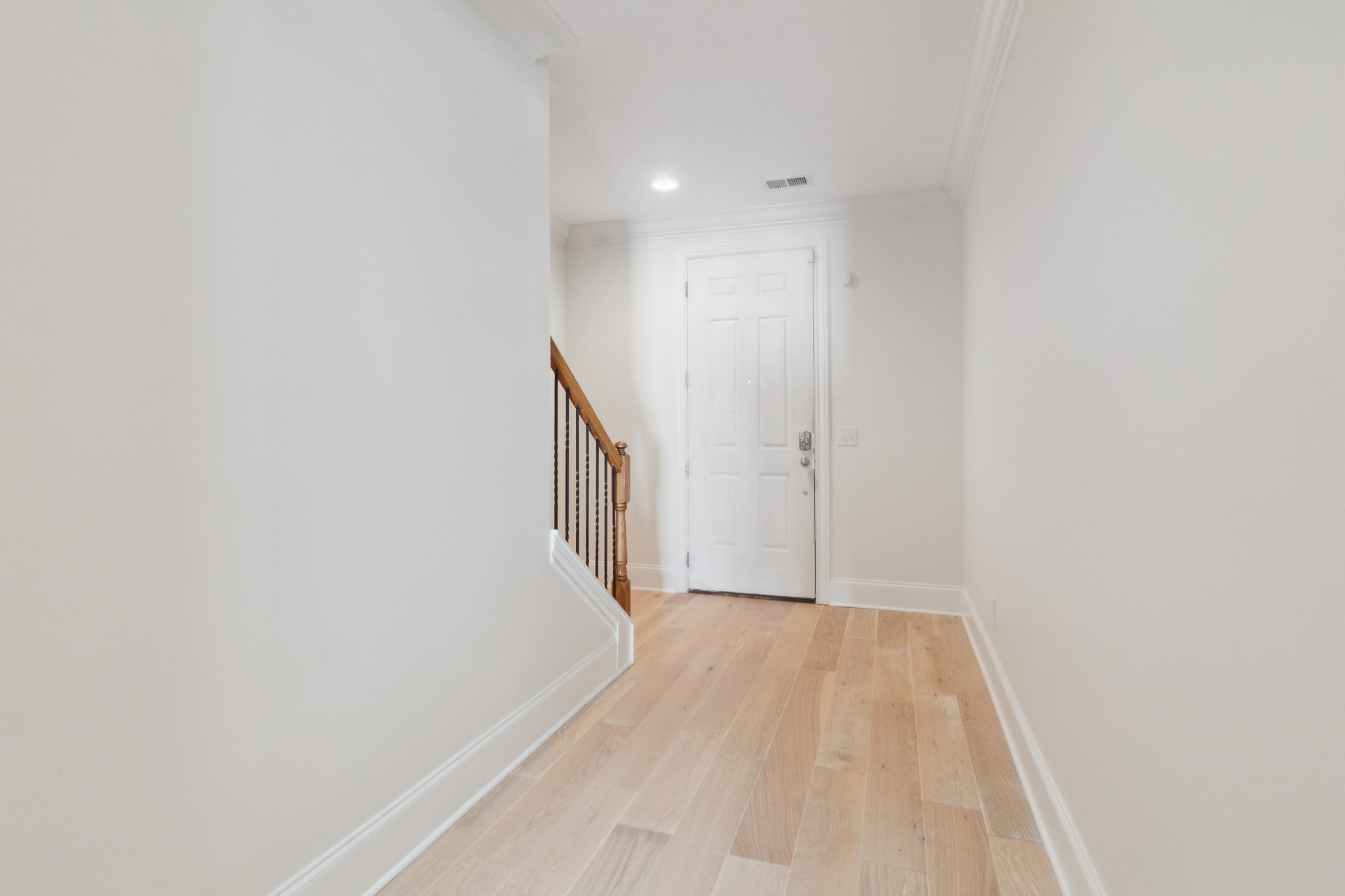 1024 Rochelle Avenue Thompson's Station, TN 37179 - Photo 6 of 37 a view of a hallway with wooden floor