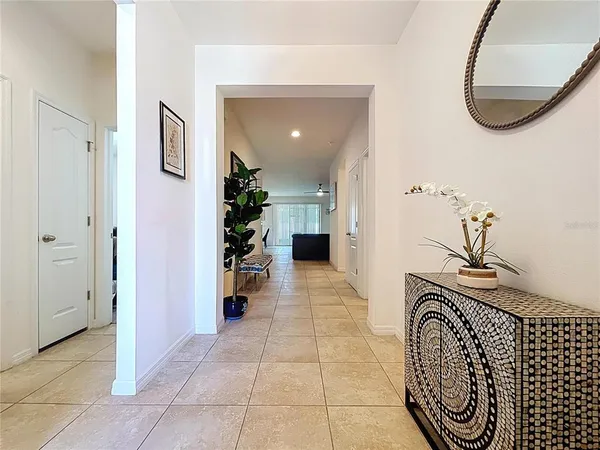 a kitchen with stainless steel appliances granite countertop a sink a stove top oven a counter top space cabinets and stainless steel appliances