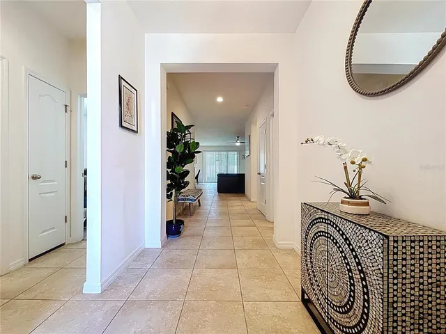 a kitchen with stainless steel appliances granite countertop a sink a stove top oven a counter top space cabinets and stainless steel appliances