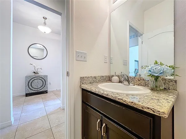 a front view of house with yard and outdoor seating