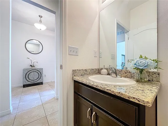 a front view of house with yard and outdoor seating