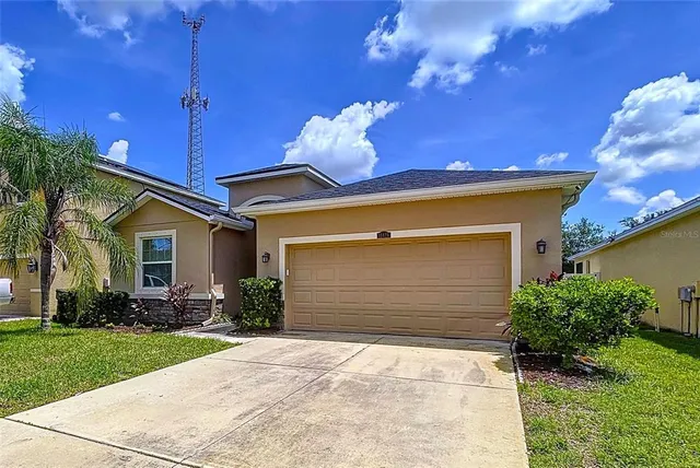 an aerial view of a house with a garden view