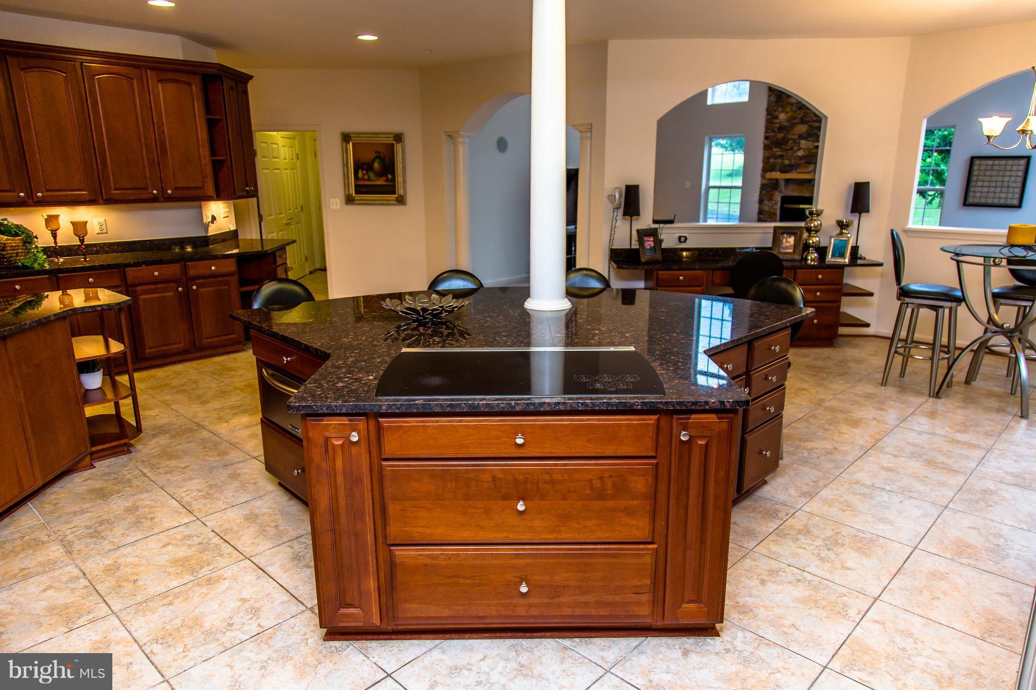 5823 Old Crain Highway Upper Marlboro, MD 20772 - Photo 15 of 30 Kitchen w/ Island ceramic tile