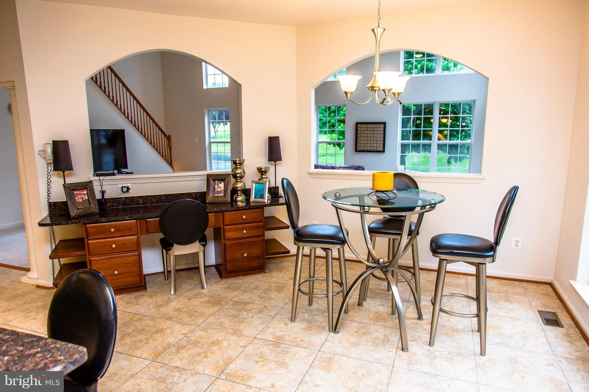 5823 Old Crain Highway Upper Marlboro, MD 20772 - Photo 3 of 30 Kitchen w/ Desk and breakfast nook