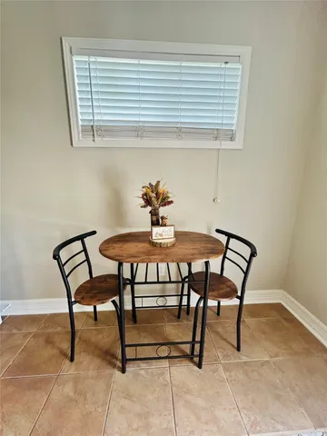 a table and chairs in a room