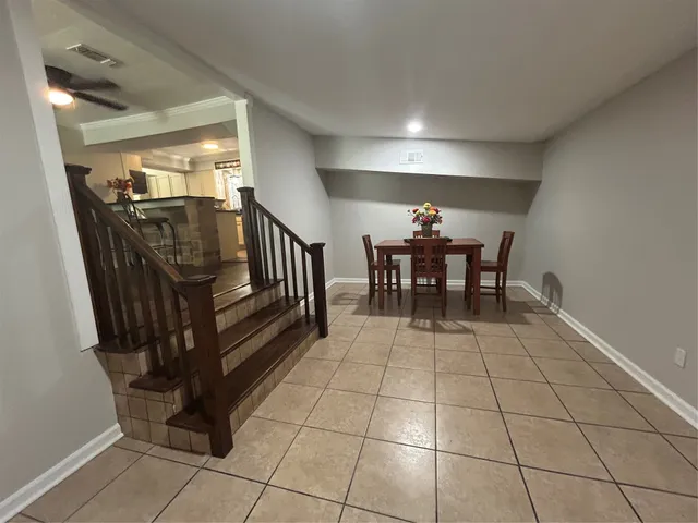 a bathroom with a double vanity sink and mirror