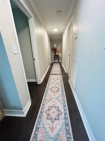 a view of an empty room and window shelves