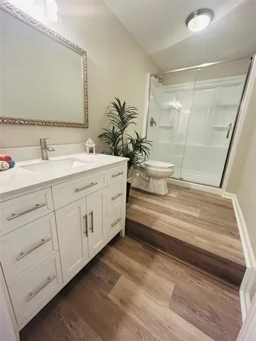 a view of a patio with a table and chairs