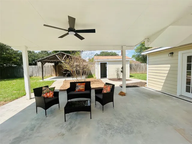 a view of a backyard with a fountain