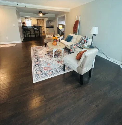 a living room with furniture and a table