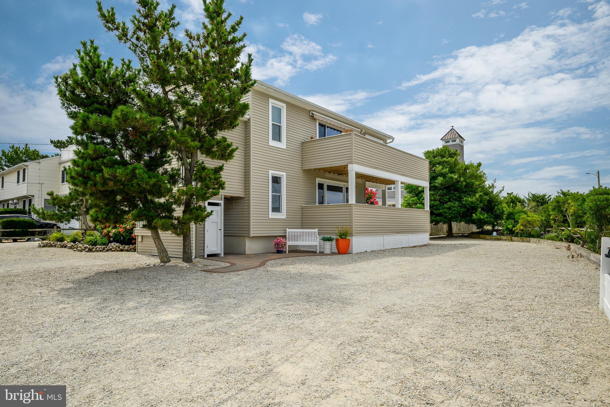a view of a house with a outdoor space and street view
