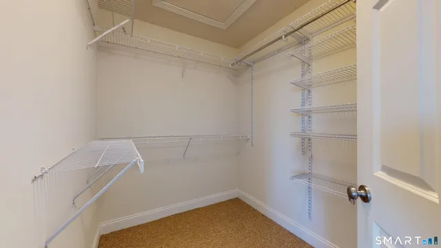 a view of a room with racks on the wall