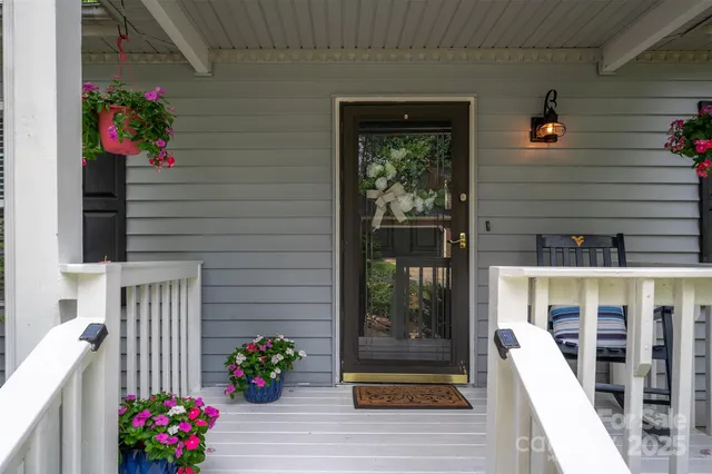 a front view of a house with a porch