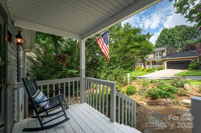 a view of a two chairs in the roof deck